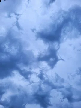 Deep blue sky with dense clouds Stock Photos