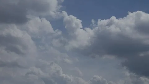 Deep Blue Sky with Dramatic White Cumulus Clouds Stock Footage 340305088