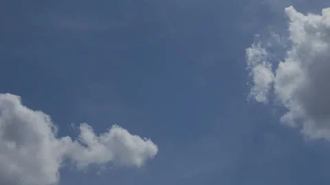 Deep Blue Sky with Dramatic White Cumulus Clouds Stock Footage 340305099