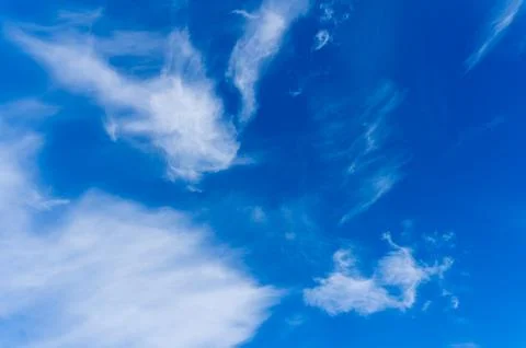 Deep blue sky with dramatic white cirrus clouds 스톡 사진