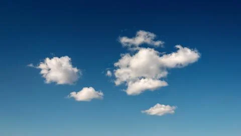 Deep blue sky with few clouds Stock-Fotos