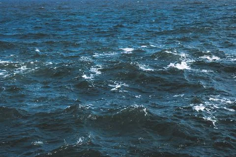 Deep blue stormy ocean water Stock Photos