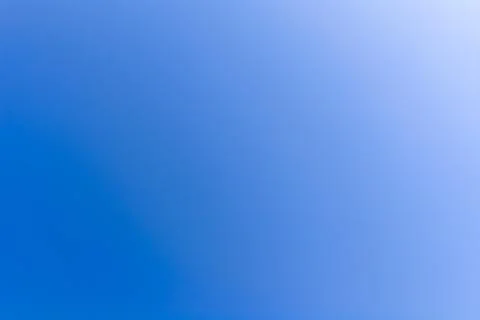 Deep blue summer sky with clean open copy space and subtle color gradient 스톡 사진