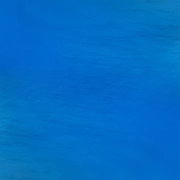 Deep blue surface of the water background Stock Photos