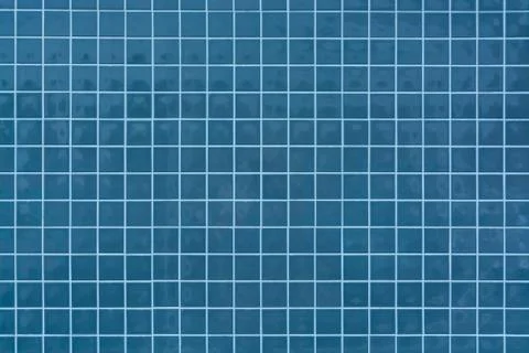Deep blue tile mosaic texture. Ceramic tile wall background. Stock Photos