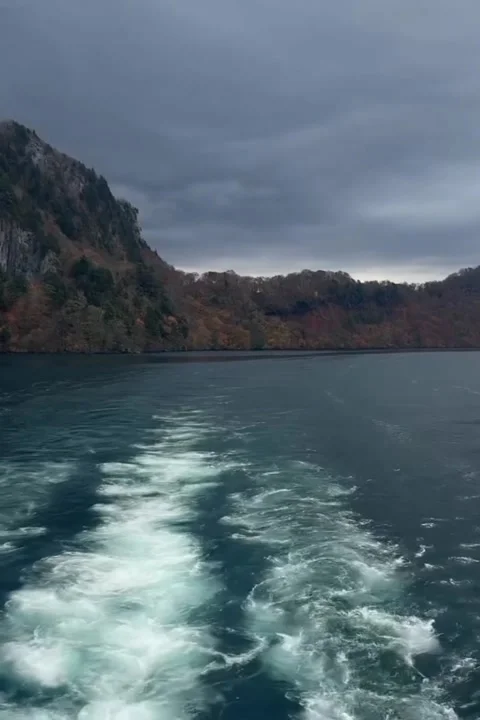 Deep Blue Wake Through Mountain Valley Waters Stock Footage 321280092