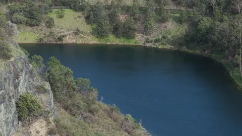 Deep blue water lake in old quarry Stock Footage 339377096