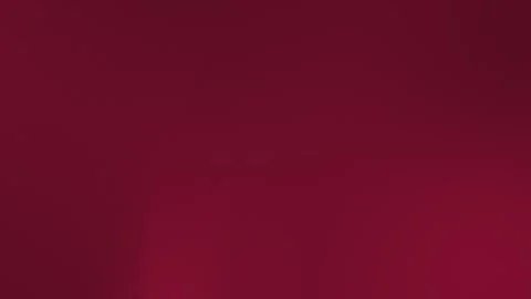Deep burgundy seamless loop background with a smooth gradient. 4K. Stock Footage 309955682