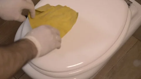 Deep cleaning WC with a yellow sponge - slow motion Stock-Footage 125521780