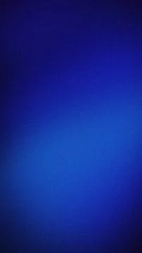 Deep cobalt blue grainy gradient background with vibrant electric blue high.. Stock Photos
