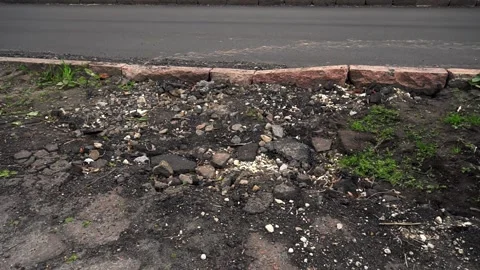 Deep cracks in asphalt. View of broken in road.  Stock Footage 154554941