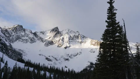 Deep in the Crazy Mountains Montana clouds over peak Stock Footage 166849425