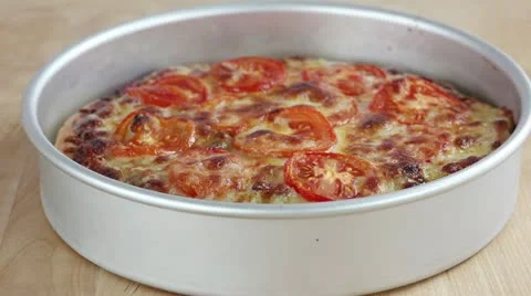 Deep Dish Pizza with Slice Removed Stock Footage 24672536