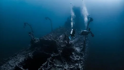 Deep Dive at Sunken Shipwreck Stock Photos