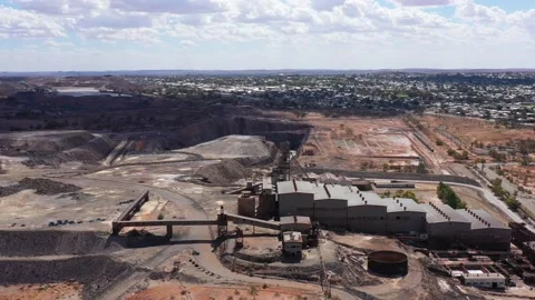Deep excavated open pit Junction mine in Broken hill city of outback as 4k. Stock Footage 171213634