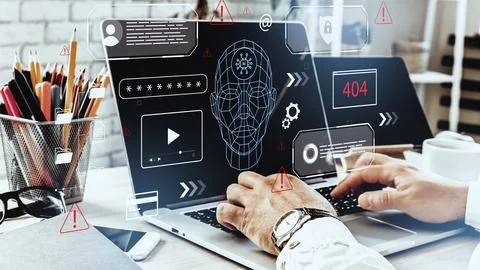 Deep fake technology displayed on a laptop with data graphics in an office Stock Photos