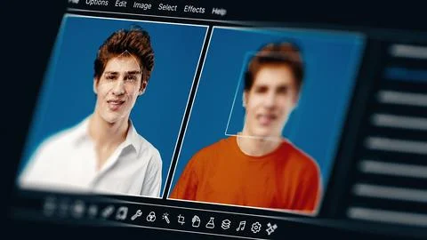 Deep fake technology shows two different faces on the screen Stock Photos