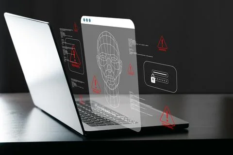 Deep fake technology shows warning signs on a laptop screen in a dark room 写真素材