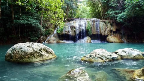 Deep forest Erawan Waterfall at Erawan National Park Stock Footage 73276527