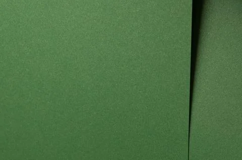 Deep forest green paper background with a smooth matte texture. Rich basil an Stock Photos