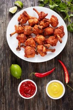 Deep fried battered crispy chicken wings Stock Photos