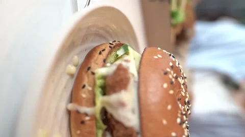 Deep-fried boneless Korean chicken burger with sweet buns Stock Footage 308835910