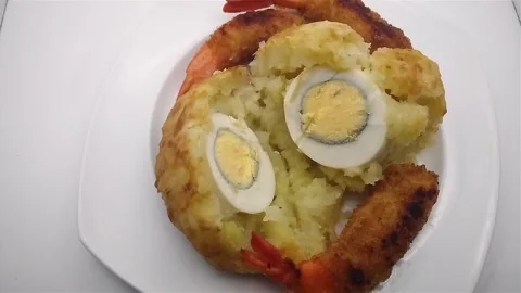 Deep fried cassava puree egg ball with breaded fried shrimps and hot sauce. Stock Footage 281953686