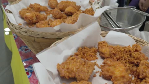 Deep fried chicken drums and wings and other types of Asian street food Stock Footage 204966686