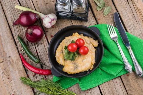 Deep-fried chop on plate with vegetable Stock Photos