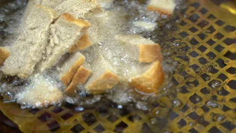 Deep-fried crackers. toasting bread in butter Video stock 129540286