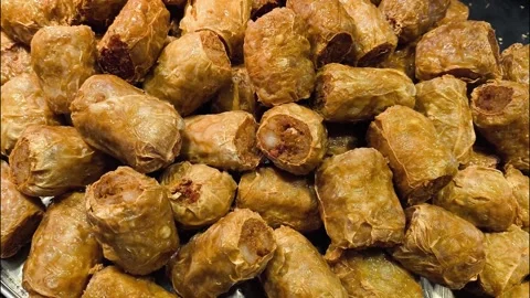 Deep-fried crap meat rolls Stock Footage 324685711