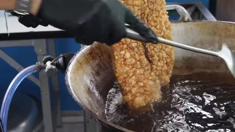 Deep Fried Crispy Pork Belly Street Food Preparation with Crackling Skin Stock Footage 338211791
