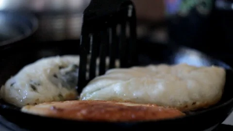 Deep-fried donuts until golden brown. Stock Footage 128241411