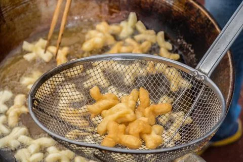 Deep fried dough stick Stock Photos