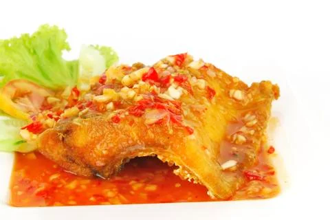 Deep fried fish meat with sweet and sour chili sauce Stock Photos