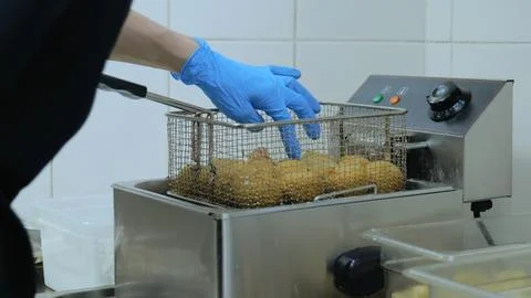 Deep-fried fixing oil, deep-fried cheese balls, junk food, fast food, unhealthy Foto stock