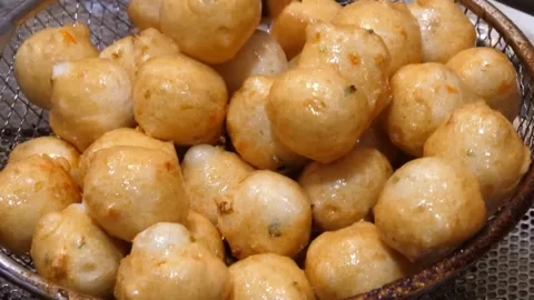 Deep Fried Korean Fish Cake (Eomuk) Balls and Sticks at a Busy Street Food Stall Stock Footage 337372779