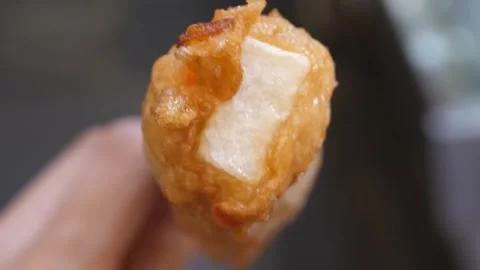 Deep-fried Korean Fish Cake (Eomuk) Street Food Snack Close-up Stock Footage 337373144