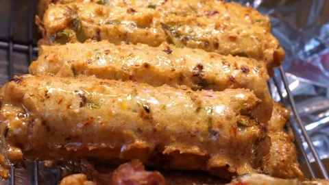 Deep-fried Korean Fish Cake Bar (Hotbar) with Spicy Glaze - Popular Street Food Stock Footage 337374397