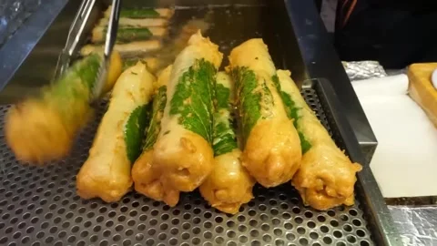 Deep-fried Korean Fish Cake (Eomuk) on Display at a Street Food Market Stock Footage 337374719