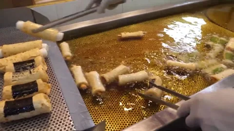 Deep-Fried Korean Fish Cake (Eomuk) Preparation at a Street Food Stall Stock Footage 337374961