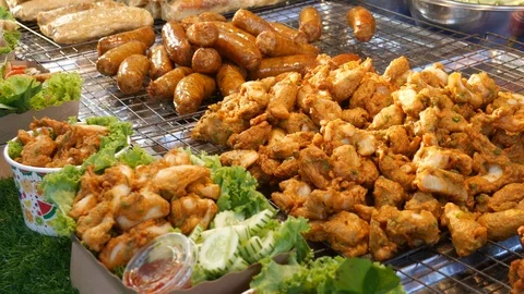 Deep fried meat balls and sausages Stock Footage 107727305