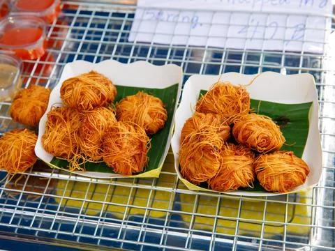 Deep Fried Pork Balls Wrap in Egg Noodles Moo Sa Rong , Thai Traditional Food Stock Photos