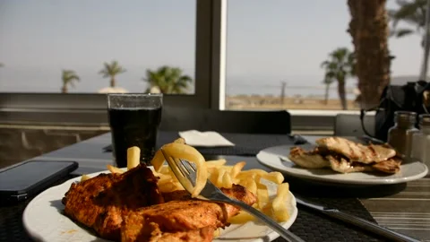 Deep fried potato with chicken nuggets low hard light Stock Footage 163079647