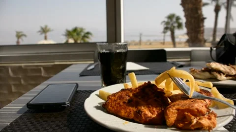 Deep fried potato with chicken nuggets low hard light Stock Footage 163079655