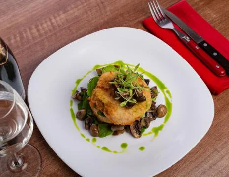 Deep Fried Potato Pancake with Mashed Potatoes, Fried Mushrooms and Herbs Stock Photos