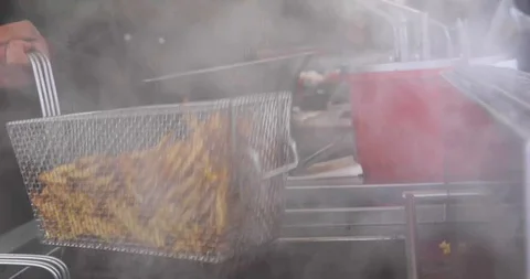 Deep Fried Potatos Stock Footage 105650399