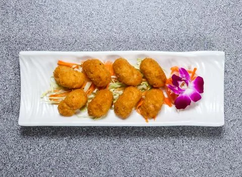 Deep fried prawn cake served in dish isolated on grey background top view o.. Foto stock