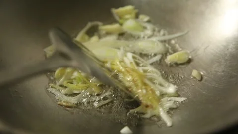 Deep fried scallion oil in stainless steel pot (1) Stock Footage 202155928