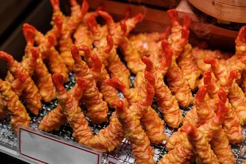 Deep fried shrimp snacks lined up at asian street market Stock Photos
